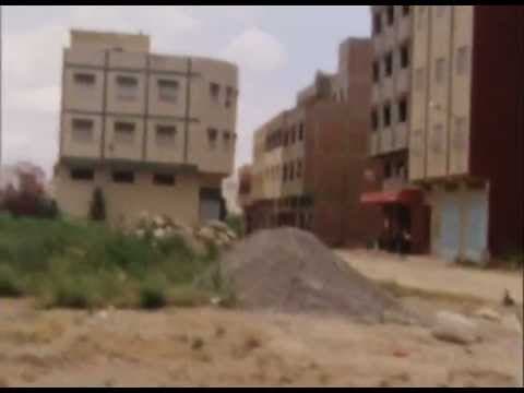 Le Bled (Buildings in a field) - Jem Cohen & Luc Sante, 2009